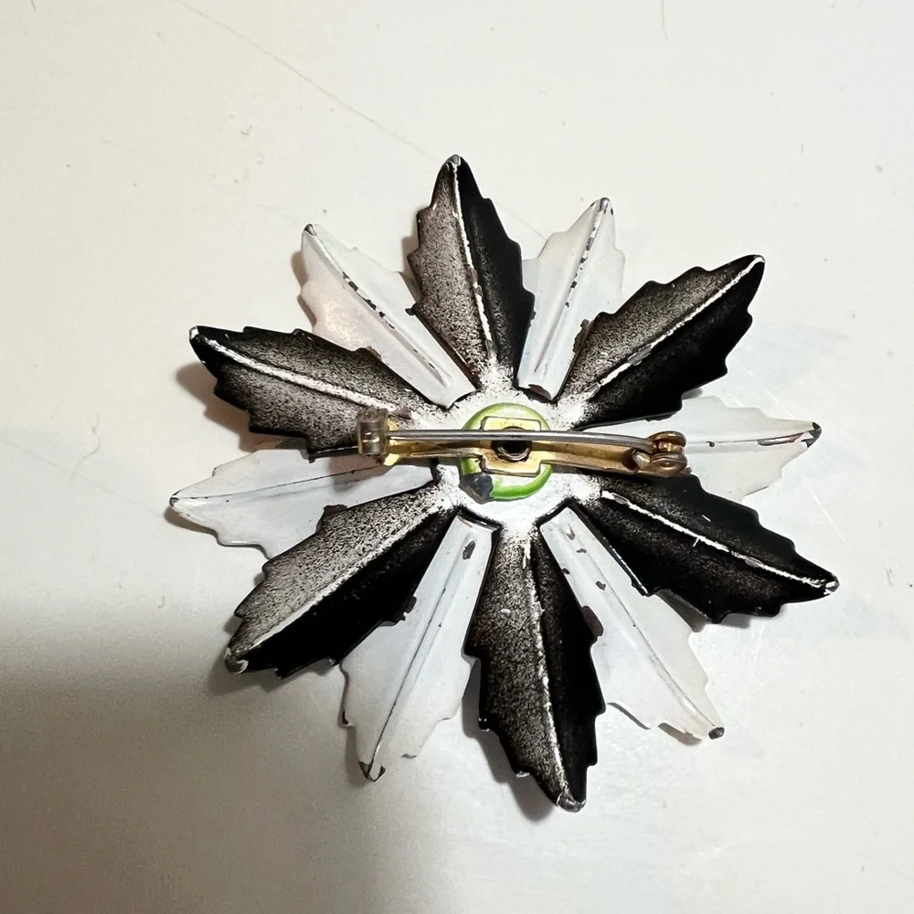Vintage floral brooch black&white enamel petals and solid black center.
